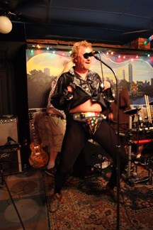 Ginger Power's demonstrating the codpiece